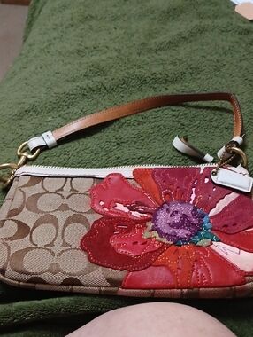 Coach Brown Signature Canvas Wristlet with Multicolor Floral Appliqué